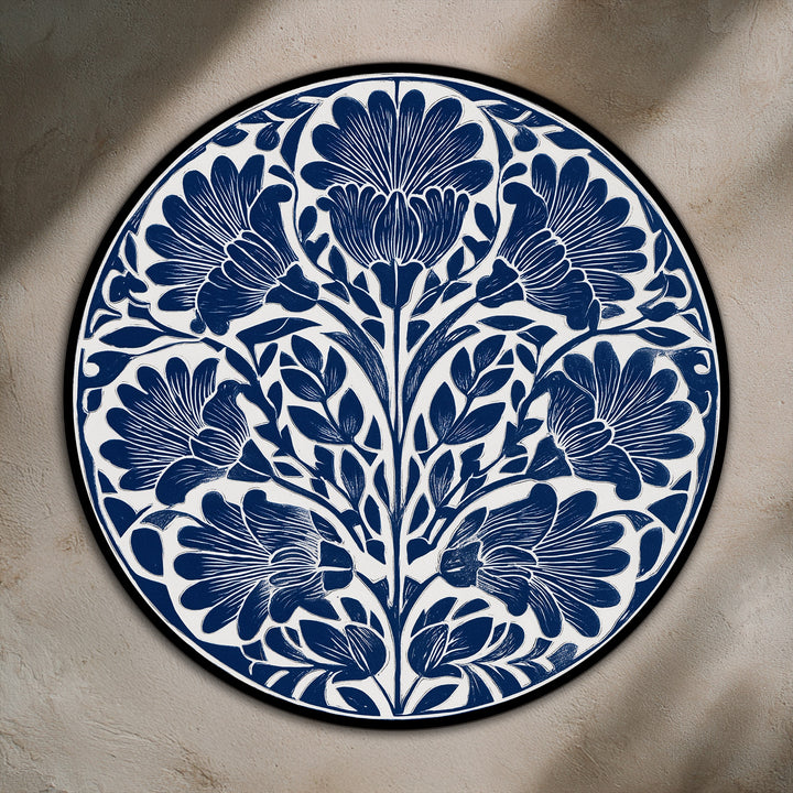 Evoking an abstract interpretation, the indigo floral motif oil painting wall art features a round botanical design with bold symmetries in this classic print.