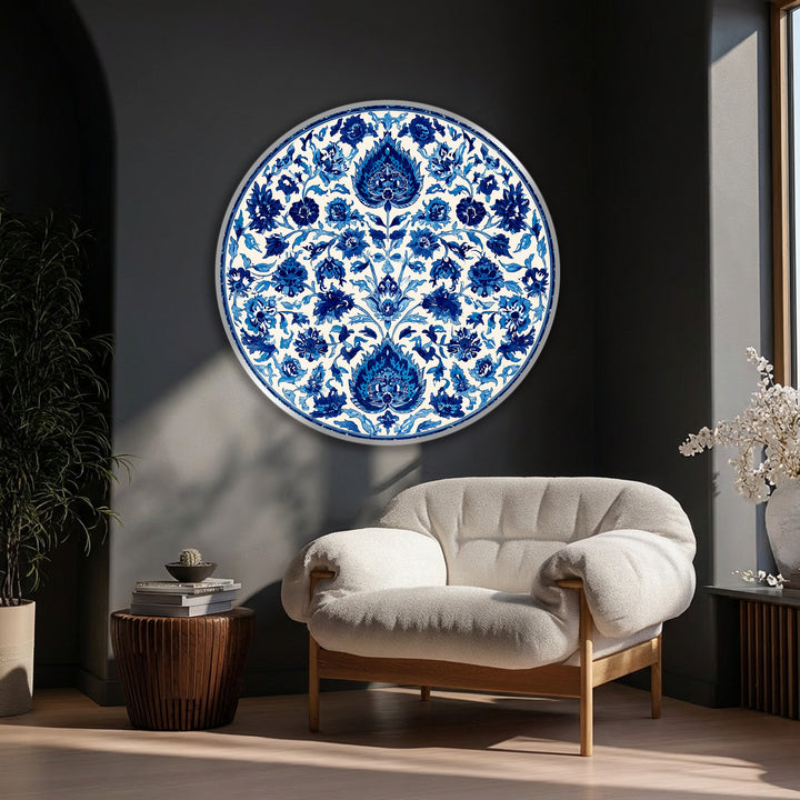 Enigmatic shadows frame the blue floral mandala round canvas art prints, contrasting against the bright, central decorative design.