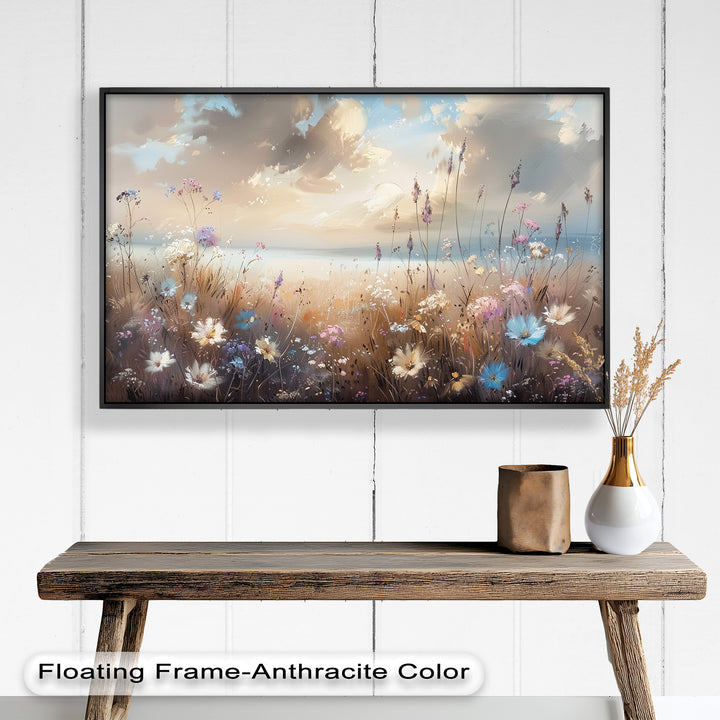 A stunning nature-inspired painting showcasing a tranquil field of wildflowers bathed in warm golden light, with soft clouds drifting across the sky.

