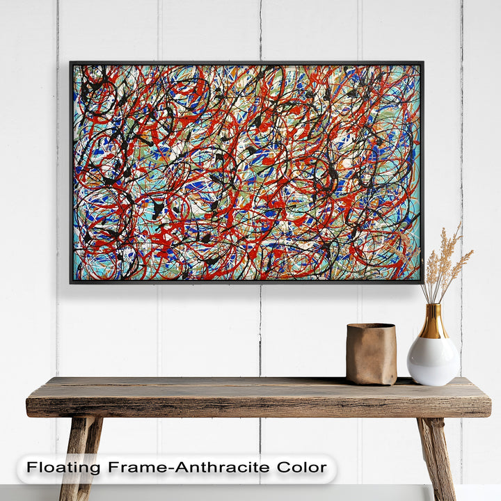 A large-scale abstract composition with an explosion of tangled lines and splashes of color, reminiscent of Pollock’s drip technique.