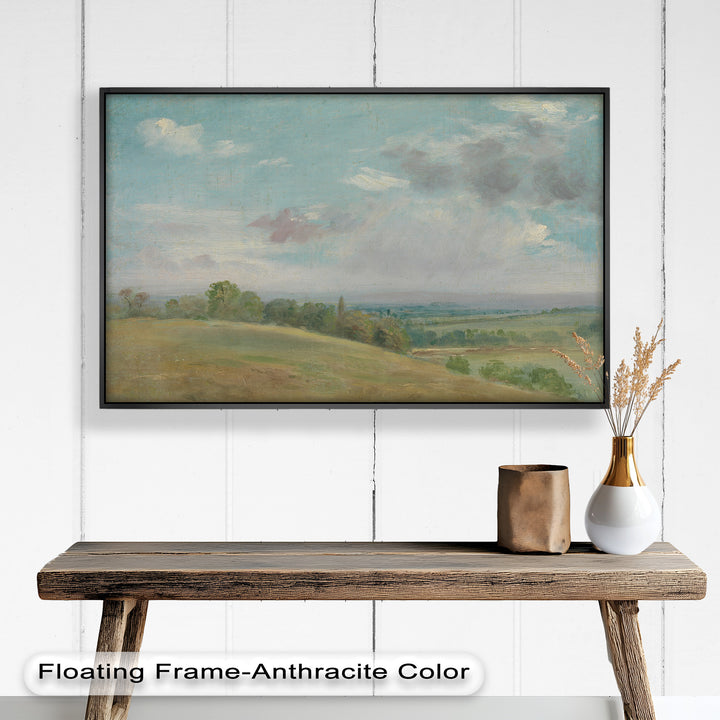 A timeless landscape artwork portraying the beauty of open nature, where golden meadows meet lush green fields beneath a softly painted sky.
