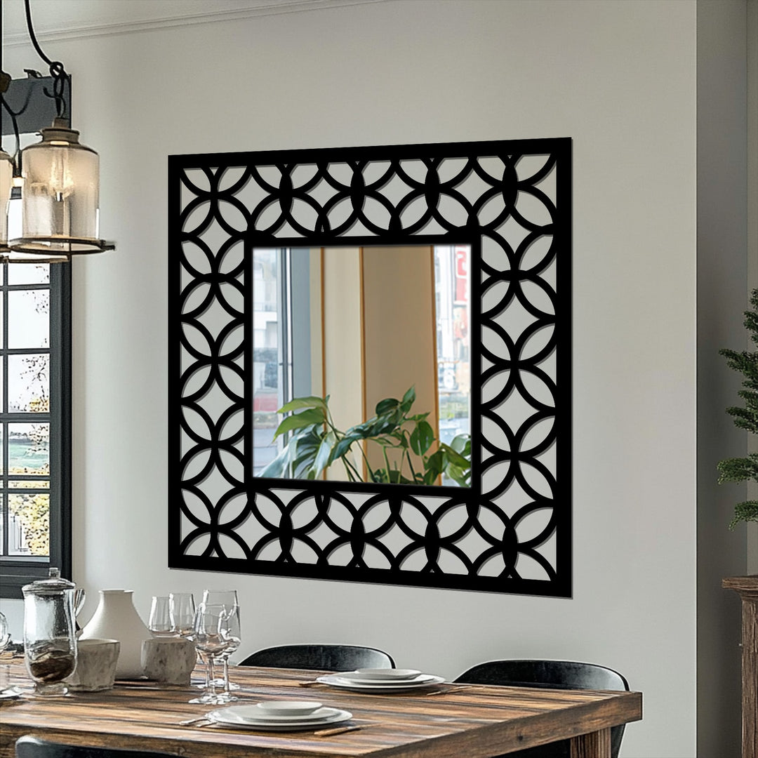 Featuring a geometric frame, the interlocking circle pattern offers a modern decoration wall art border around this square floor mirror's reflective center.