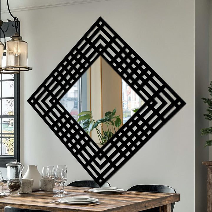 Organic forms are reflected in the modern mirror, framed by a metal artwork featuring a layered grid and diamond geometric pattern.