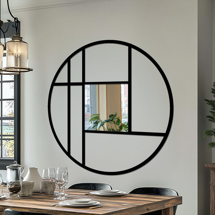 Light and shadow play across the geometric metal frame of this black floor mirror, highlighting its unique design and adding depth to this modern mirror.