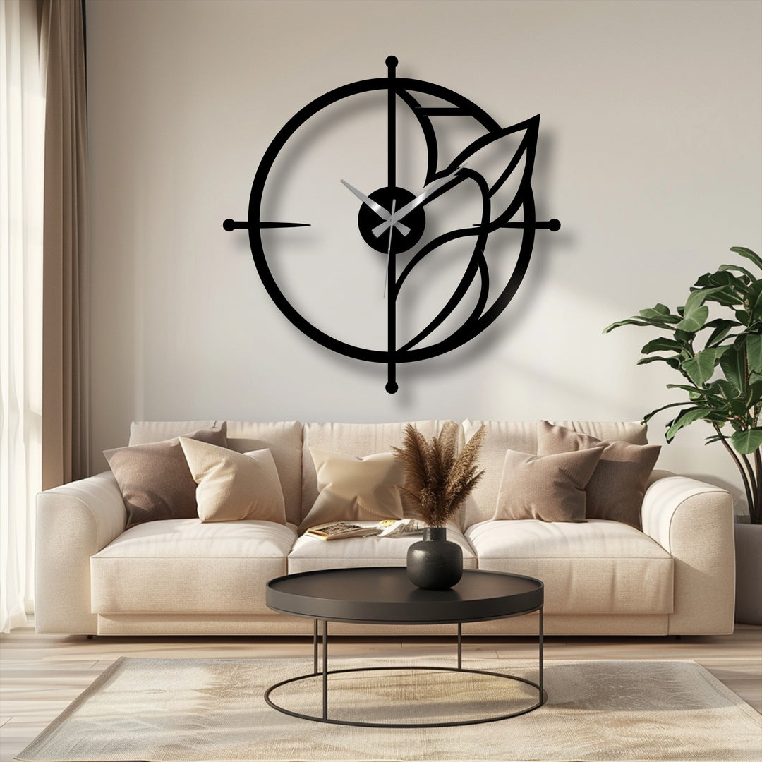 Showcasing the abstract quality of this modern leaf accent circular metal artwork, the minimalist wall clock is a striking geometric statement.