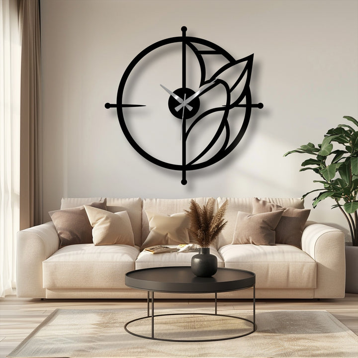 Showcasing the abstract quality of this modern leaf accent circular metal artwork, the minimalist wall clock is a striking geometric statement.