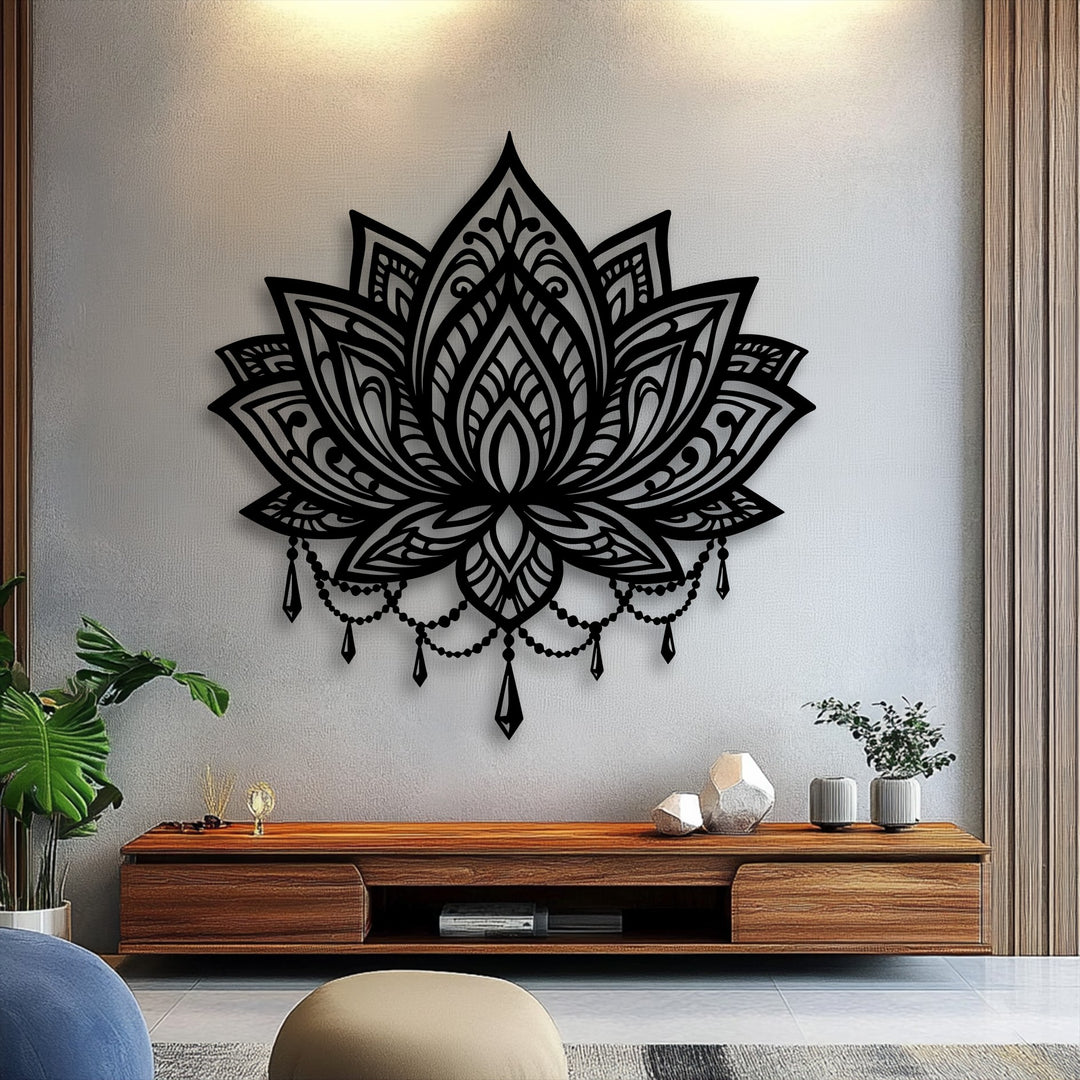 The intricate patterns and cascading beadwork of the ornate lotus mandala metal wall decor create a mesmerizing visual rhythm against the textured wall.