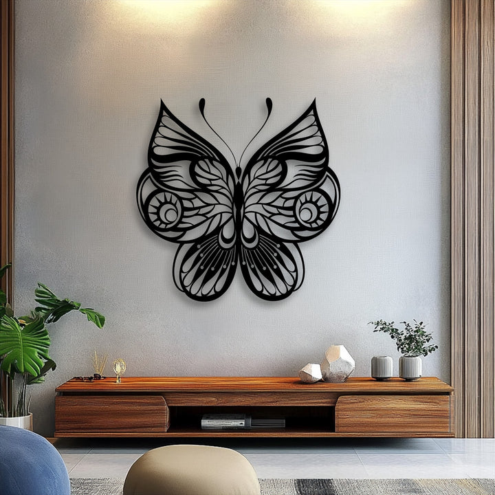 Stillness defines the space, highlighted by the intricate details of the ornate butterfly unique metal wall art, elegantly mounted.