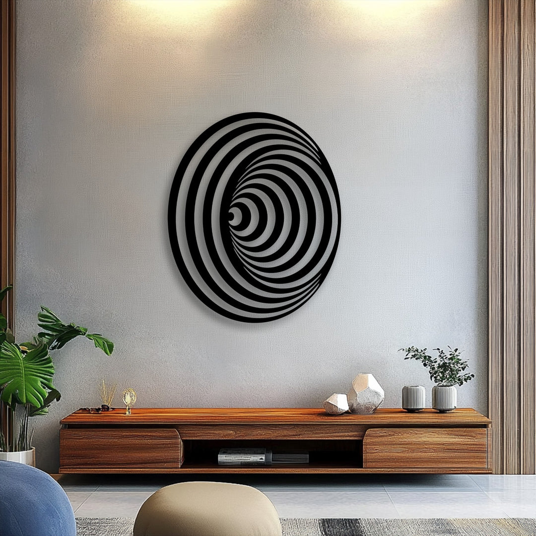 The sleek, dark finish of this hypnotic spiral metal art for wall creates a compelling geometric illusion with subtle reflections.