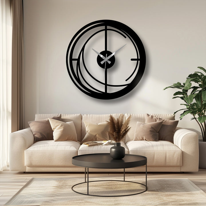 Featuring geometric elements, this decorative metal art clock presents an abstract spiral design with circular and linear forms for modern wall decor.