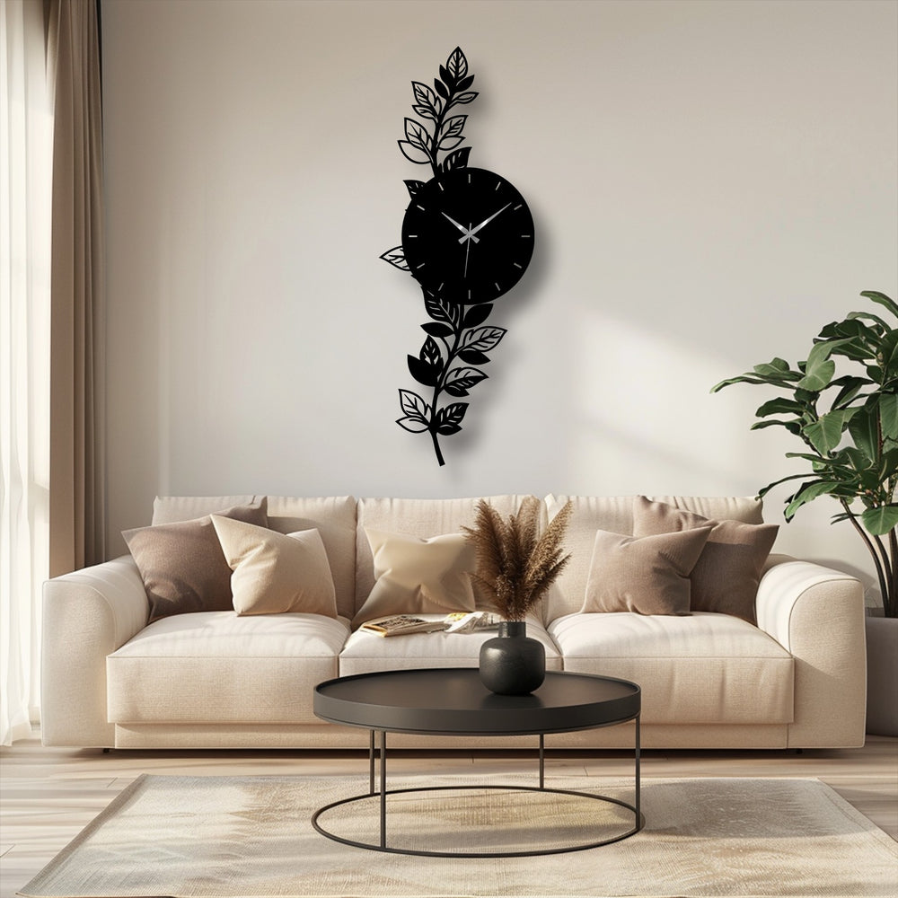 Swaying botanical leaf branches create a dynamic sense of movement around this decorative metal art for wall clock, infusing nature-inspired elegance into any space.