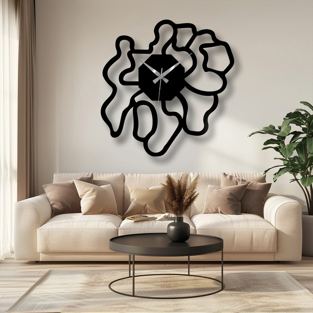Black dominates this decoration wall art in the abstract organic shape metal wall clock, adding a touch of modern artistic design to the room's decor.