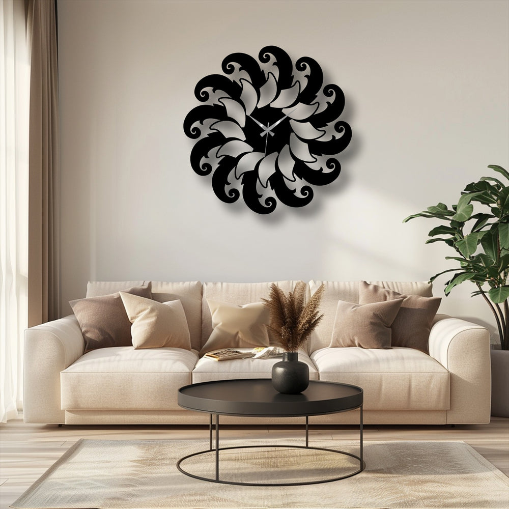 The elegant geometric floral spiral pattern of the black and silver wall clock makes it a striking piece of decorative metal art.