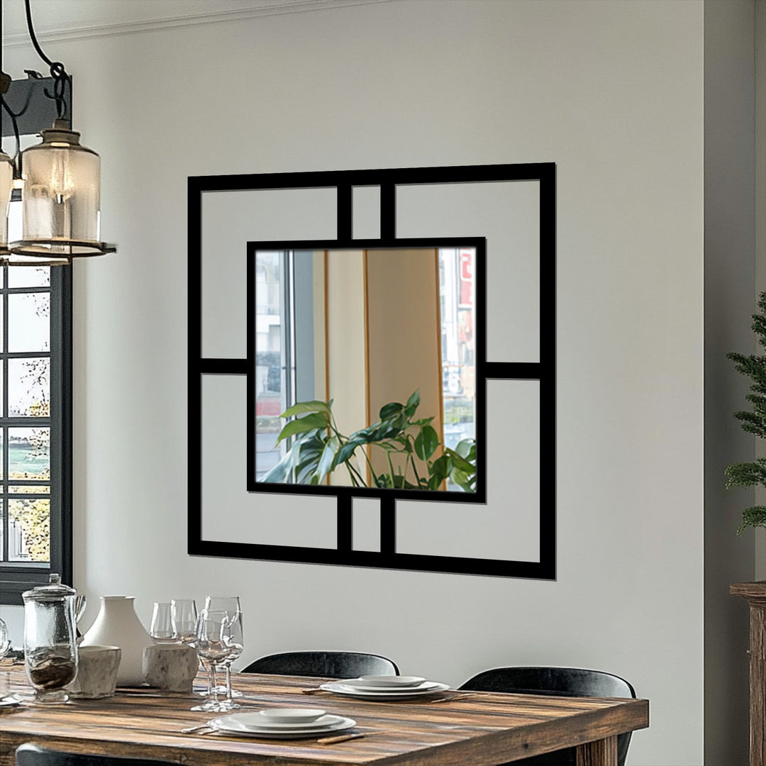 Reflecting depth and layers, a framed wall mirror features a geometric design creating multiple planes within its modern square frame.