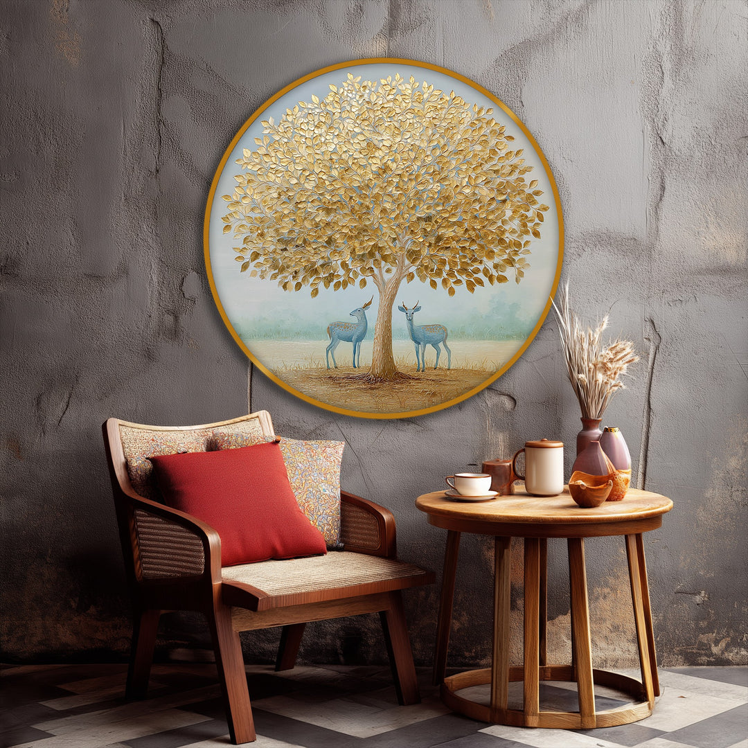 Round golden tree canvas print showcases organic forms of deer and a tree with gold leaves, offering a nature-inspired hanging canvas art.