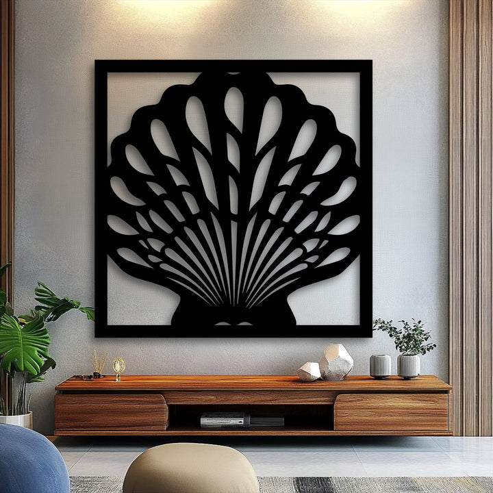 A plush, light beige cushion softens the room's aesthetic, complementing the elegant seashell frame metal decoration wall art.