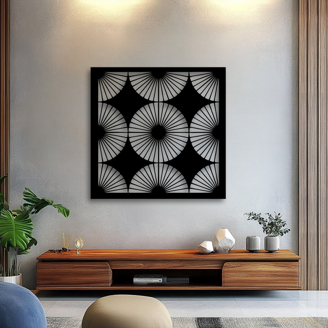 The striking negative space in this radiant fan pattern metal wall decor accentuates the geometric symmetry of the design.