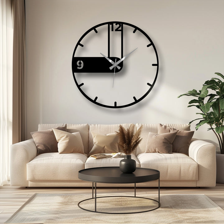 Crafted with precision, this modern asymmetrical black metal wall clock exemplifies quality metal art for wall decor, showcasing a minimalist and contemporary design.