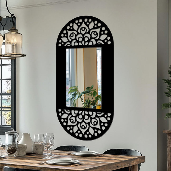 Warm color temperature illuminates the mandala floral pattern on this oval decorative floor mirror with a black metal art for wall frame.