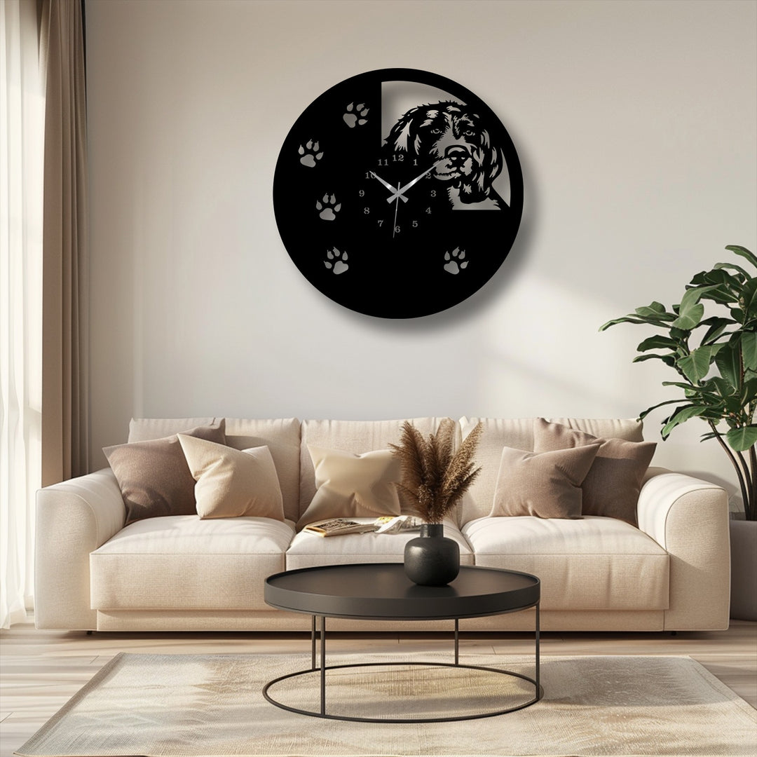 Soft sunlight casts distinct shadows, highlighting the intricate dog silhouette metal wall decor and scattered paw prints on the black wall clock.