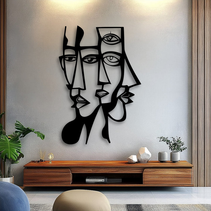 Geometric lines shape the abstract dual faces of this captivating modern metal art for wall, featuring artistic, interlocking designs.