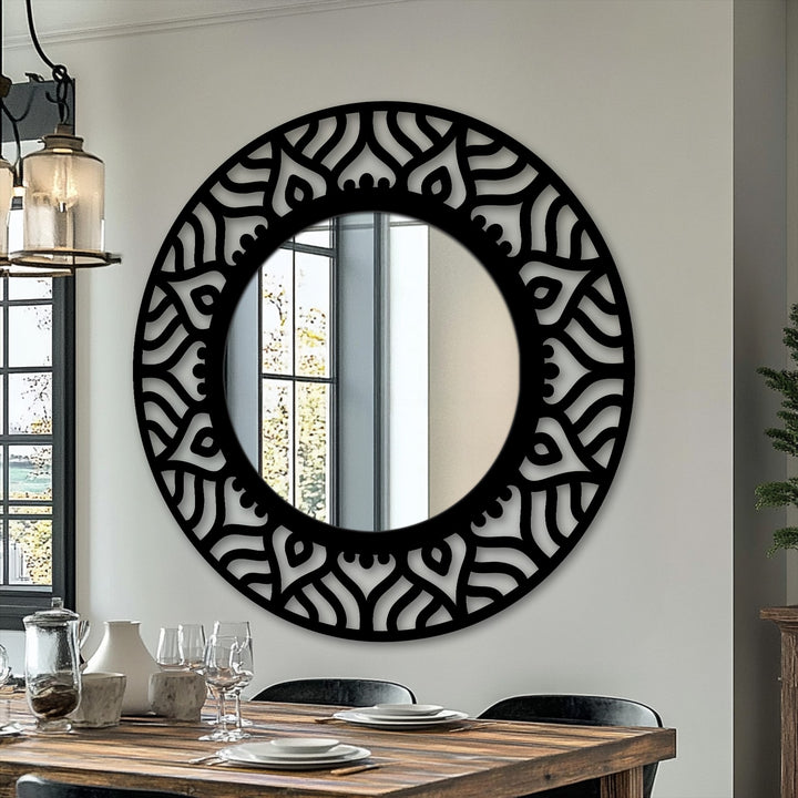 Crafted with a sturdy black metal frame showcasing an abstract pattern, this modern mirror offers both durability and striking design for your space.