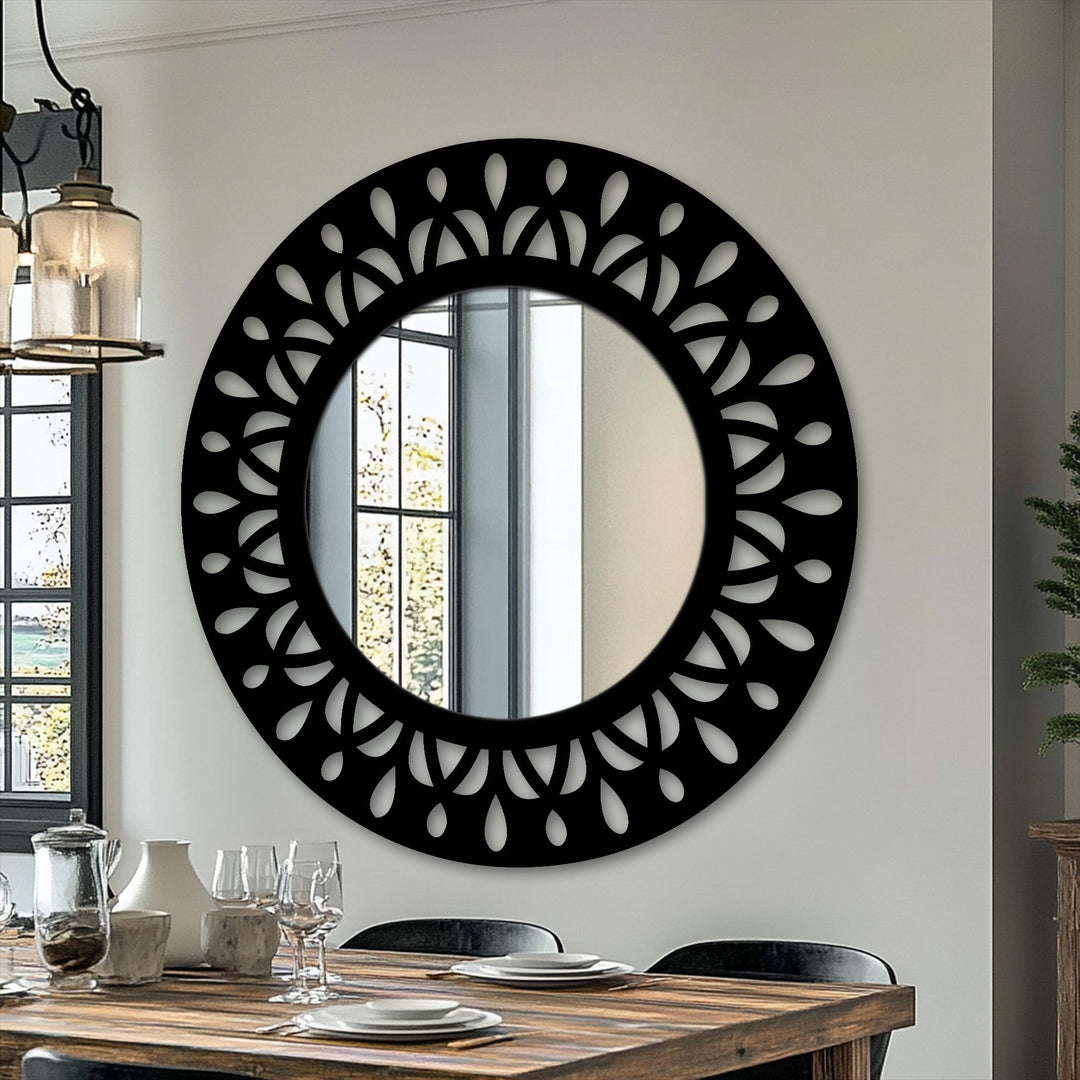 The background features a pristine white wall, elegantly showcasing a stylish black decorative mirror that reflects a sunlit window and a dining room scene.