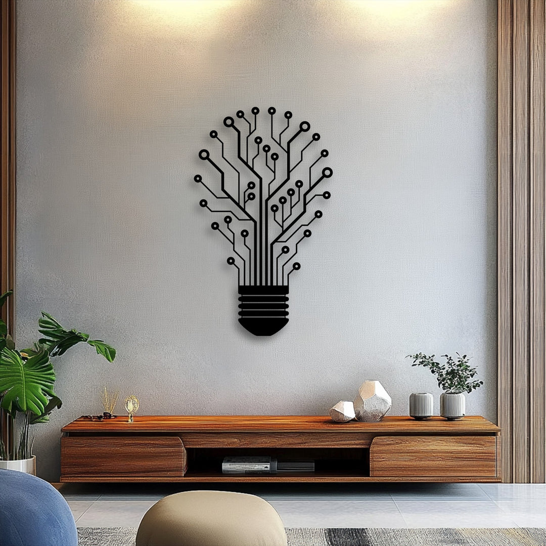 A textured light gray wall with warm overhead lighting and vertical wooden paneling provides a modern backdrop for the unique metal wall art.