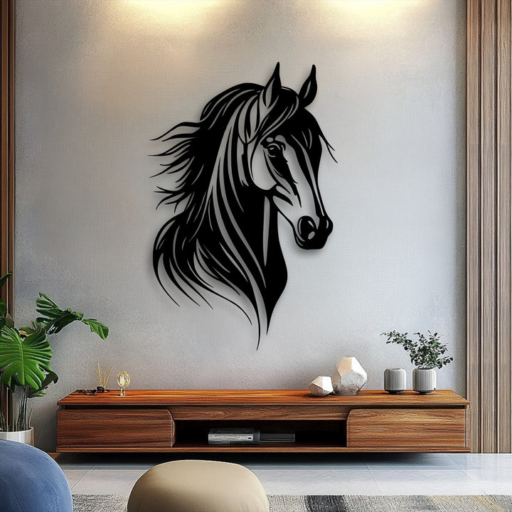 Dramatic light and shadow accentuate the sleek lines and flowing mane of the black horse head metal artwork mounted on a textured wall.