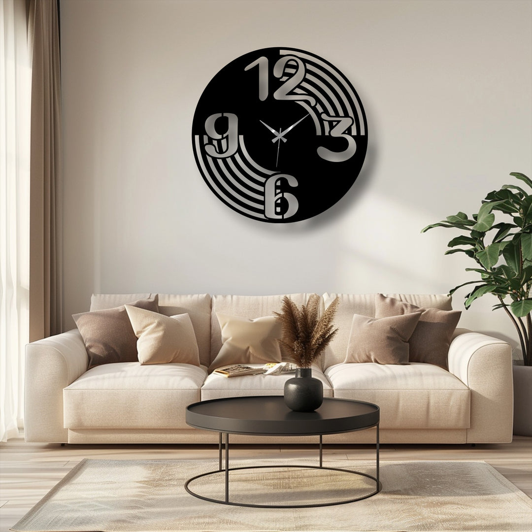 A striking modern flow number wall clock, a sleek piece of metal art for wall, features a minimal curve design in black and silver.
