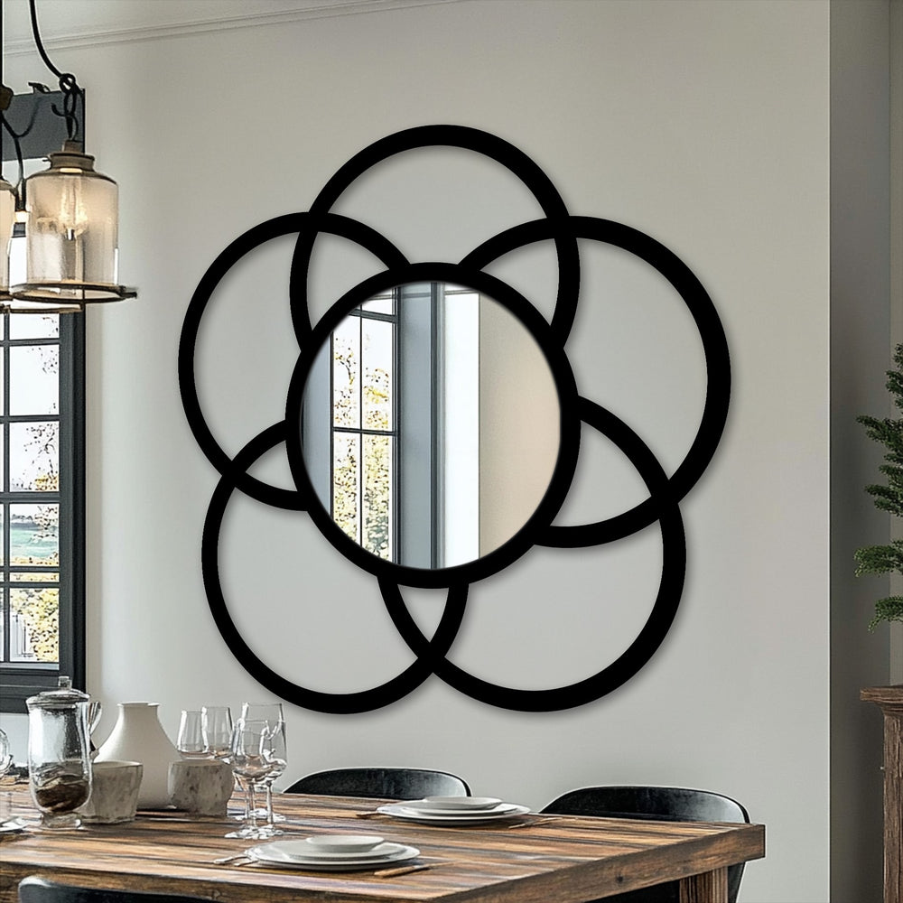 The realistic detail showcases a modern interlocking circle floor mirror in black, a striking statement piece and a practical bathroom mirror for contemporary decor.