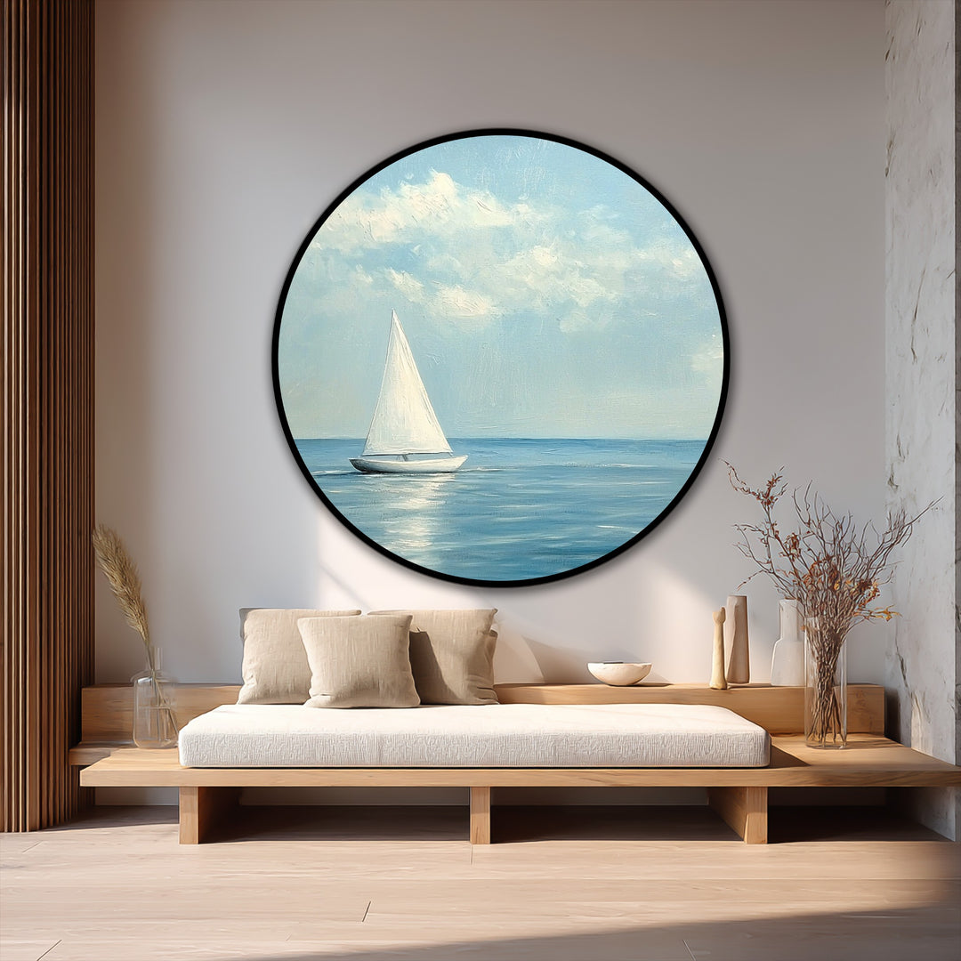 The stillness of the serene blue sea is captured in this round oil painting, a piece of modern oil painting art featuring a minimalist sailboat under a cloud-soft sky.