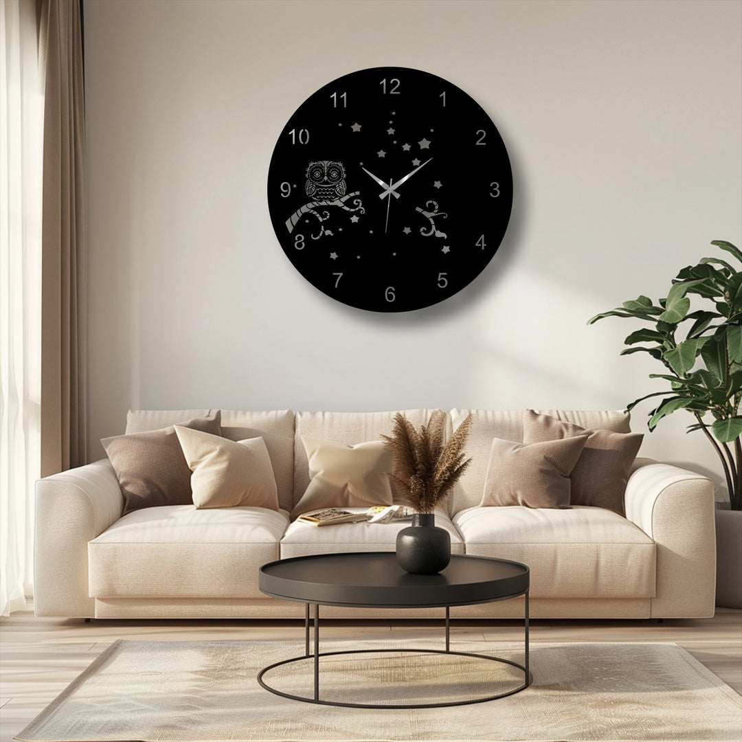 Light and shadow dramatically highlight the black owl night metal wall decor, casting soft gradients across its starry sky design.