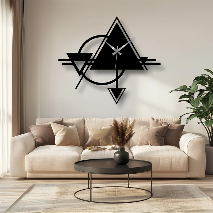 Negative space highlights the abstract geometric metal wall clock's triangle and circle design, showcasing unique decorative metal art that complements the room's neutral tones.