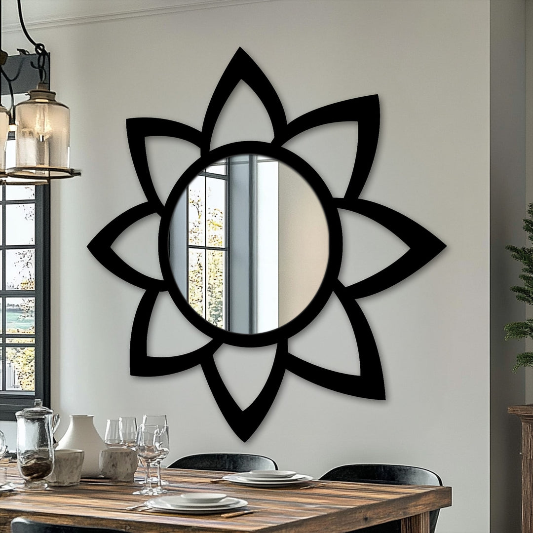Reflecting the softest light, this minimal petal floor mirror with its dark frame presents striking contrast in modern metal wall decor.