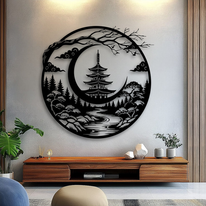 A circular metal art for wall showcases crisp, defined edges forming a Japanese pagoda and a moonlit serene landscape silhouette.