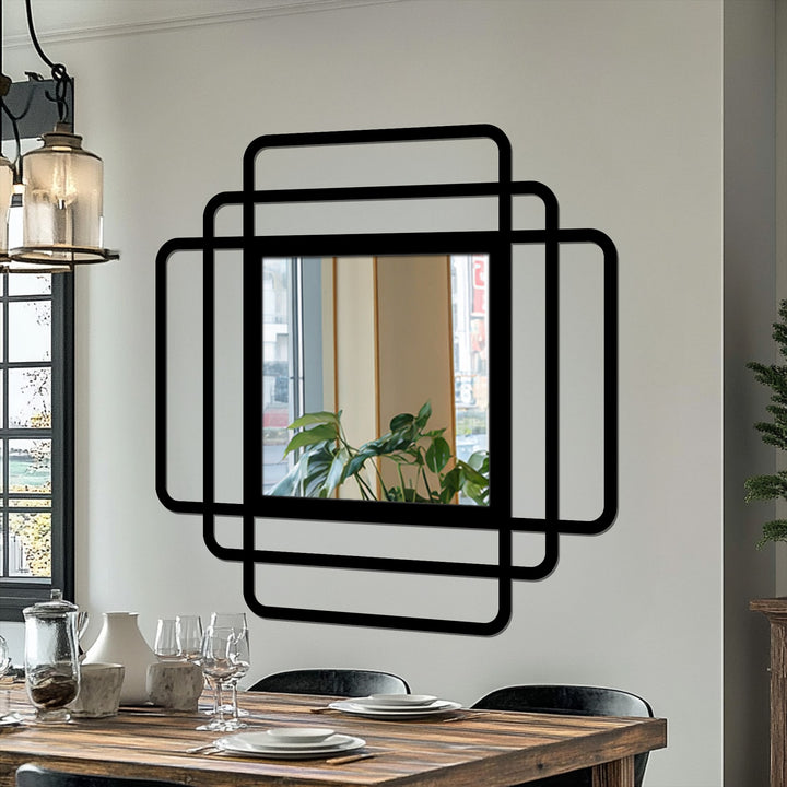 Reflected in the Layered Frames rounded square modern mirror, the indoor plant's gentle curves offer a soft contrast to the angular metal art for wall.