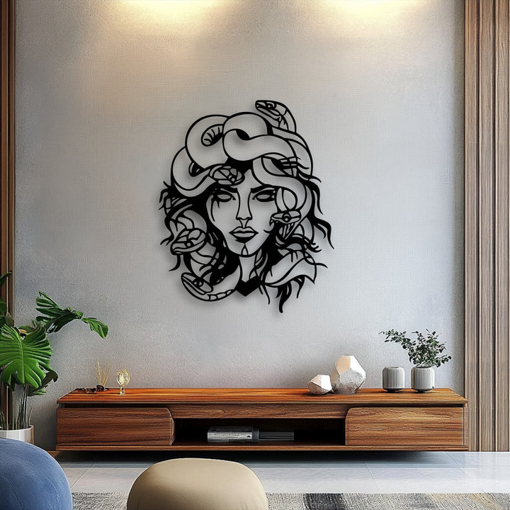 The sleek Medusa metal wall art, featuring intricate snakes, provides a calm and poised mythological decoration wall art piece.