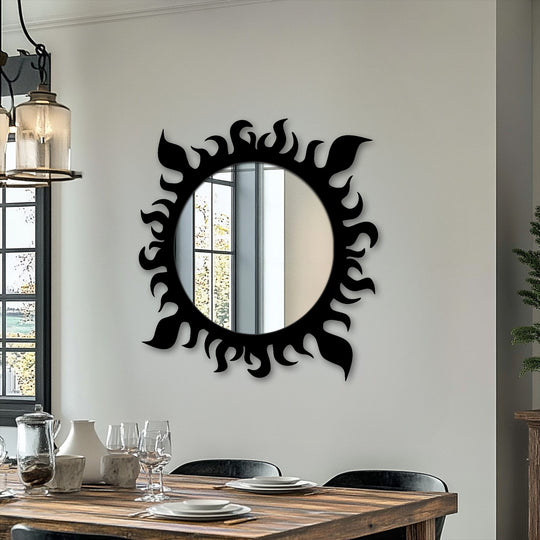 Foreground dining table settings highlight the reflected Solar Flame round decorative bathroom mirror hanging on the wall.