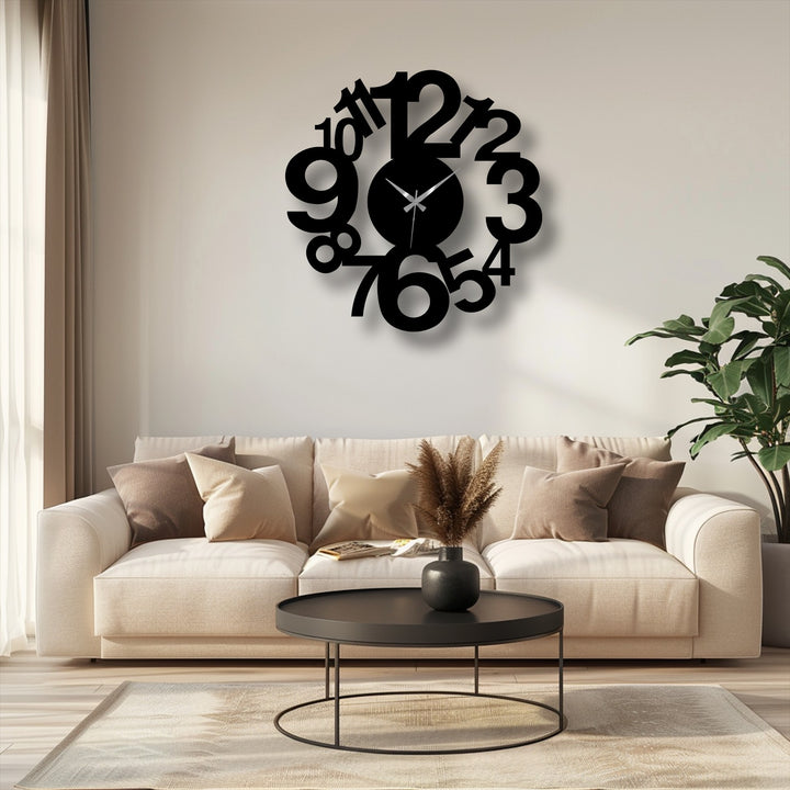 Neutral tones in the background emphasize the spiral metal wall clock, adding an element of modern metal wall decor to the interior's home decoration.