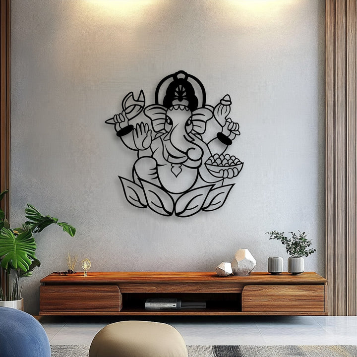 Organic forms of the sacred Ganesha elephant deity, gracefully poised on a lotus, form striking metal decoration wall art.