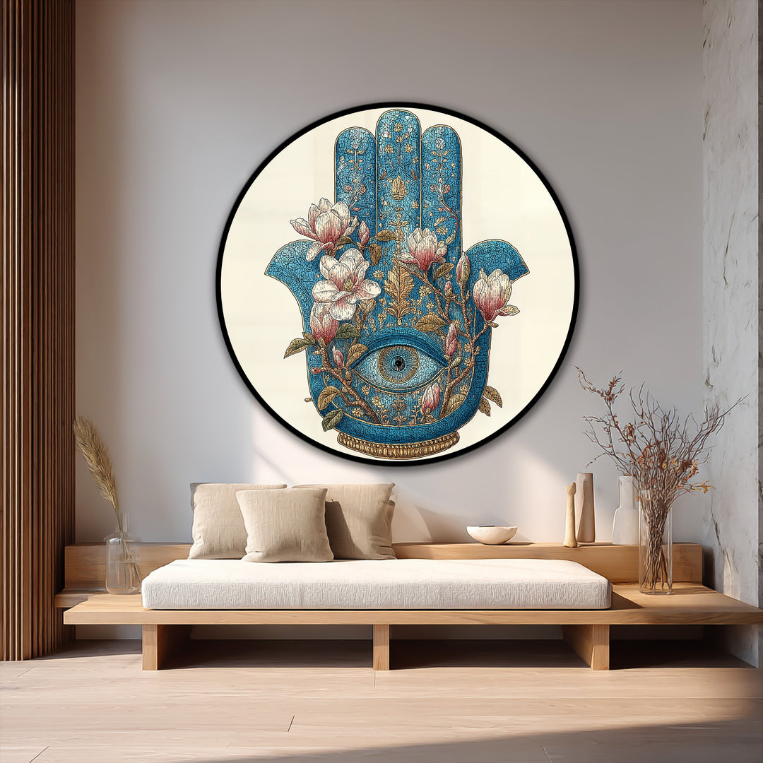 Warm color temperature enhances the ethereal, round floral Hamsa eye oil painting wall art, creating a serene focal point in the cozy living space.