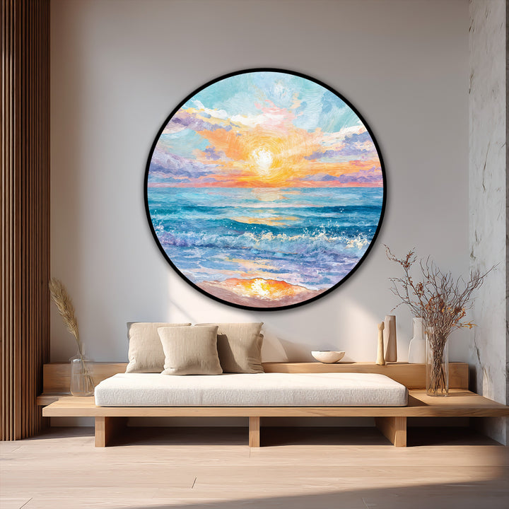 Warm color temperatures radiate from the golden sun in this round oil painting artwork, creating a vibrant seaside sunrise with hues of orange, yellow, and gentle blues.