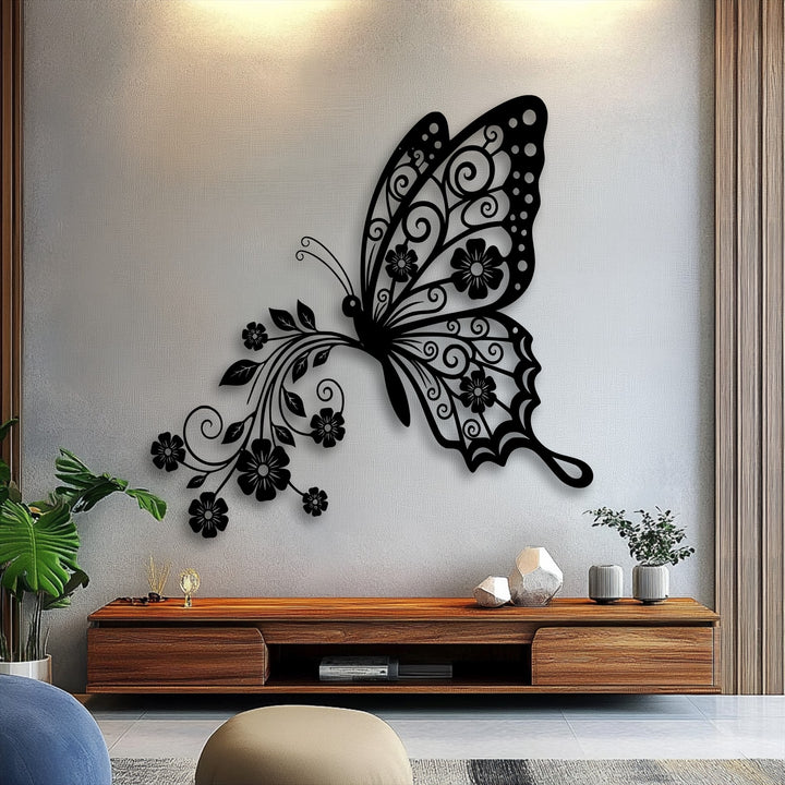 The striking negative space of the black floral butterfly metal wall decor creates an elegant display, defining this unique Metal Wall Art.