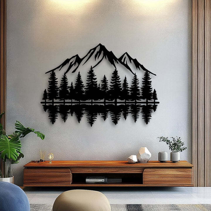 A horizontal silhouette of intricate metal artwork beautifully depicts a serene mountain forest reflection, perfect for nature landscape decor.