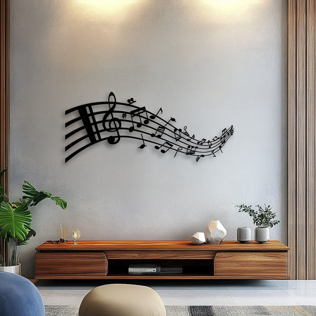 A textured light grey wall, subtly illuminated from above, beautifully showcases the elegant flowing musical notes metal art for wall.