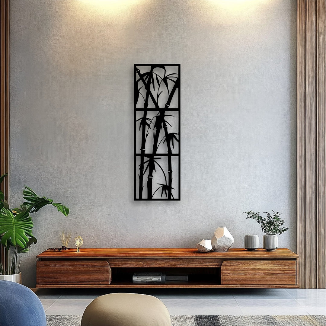 A softly textured beige pouf anchors the minimalist room, featuring a striking bamboo metal decoration wall art.