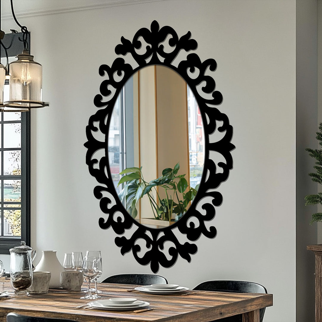 Negative space defines the baroque curves of this framed wall mirror, creating an oval window that reflects a serene indoor plant.