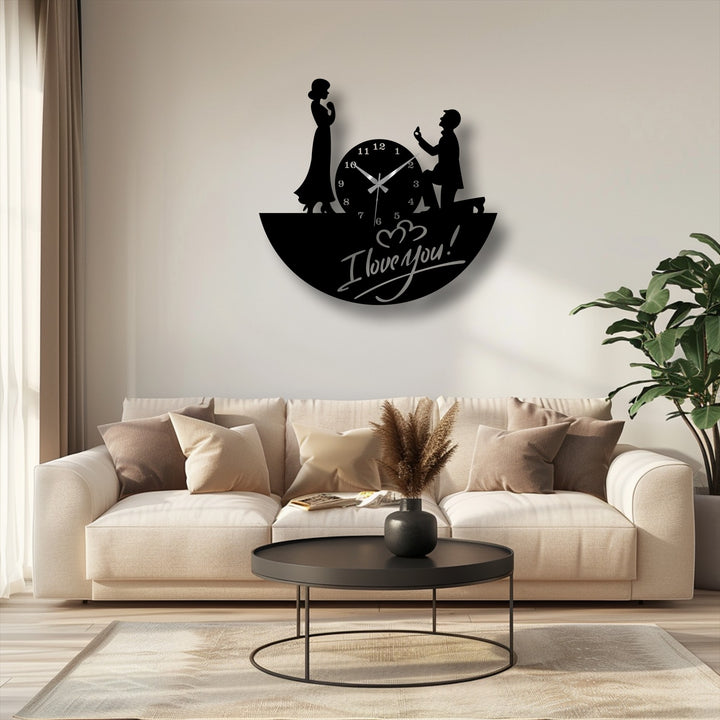 Foreground focus highlights the depth and layers of this romantic love proposal metal artwork silhouette clock against a soft backdrop.