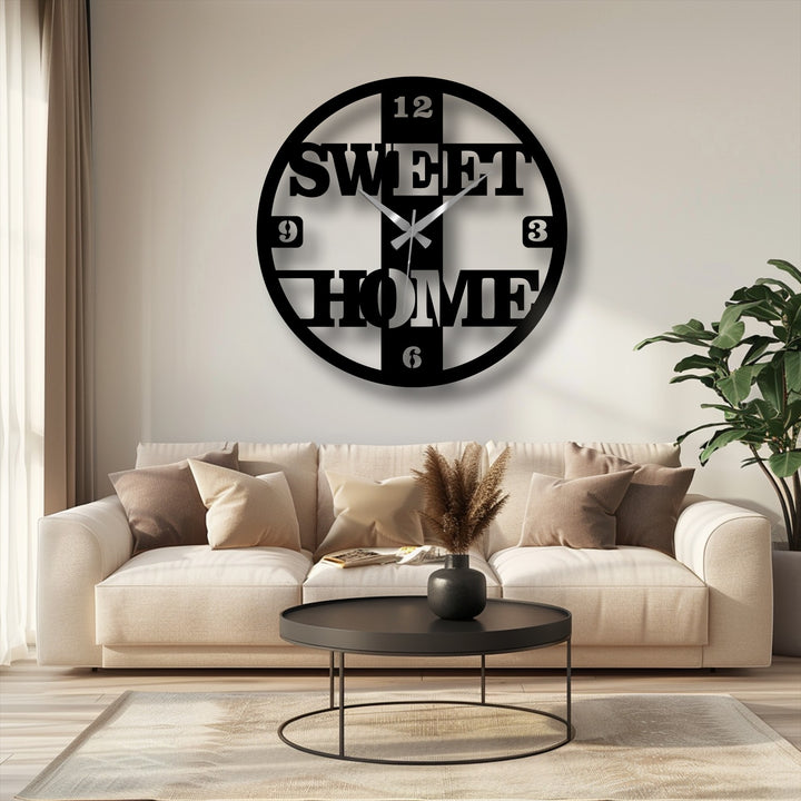 Showcasing the realistic detail, the 'Sweet Home' unique metal wall art clock features precisely cut lettering and a modern design, creating an eye-catching statement piece.
